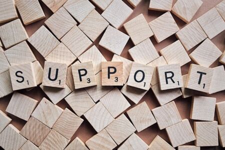 support written with wood tiles.